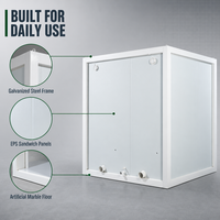 Cabine de toilettes portable blanche à double porte avec lavabo central pour les installations extérieures