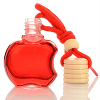 Désodorisant de voiture suspendu Diffuseur de parfum de voiture vide Bouteille en verre colorée en forme de pomme 8ml avec bouchon en bois