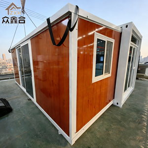 Prix de gros – Maison conteneur extensible de 40 pieds, 4 chambres, maison préfabriquée, cabane modulaire <span class=keywords><strong>pour</strong></span> hôtel/<span class=keywords><strong>camping</strong></span> avec terrasse et toit - Product Image 1