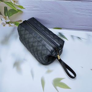 Sac de maquillage noir brodé pour femme, nouvelle mode, grande capacité, sac de rangement pour la maison et les voyages, fabriqué en usine BSCI - Product Image 1