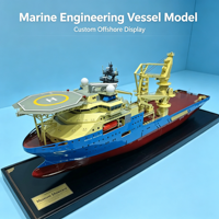 Modèle de navire de soutien offshore personnalisé avec coque bleue, superstructure jaune, fond rouge et pont de grue