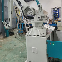 Robot d'emballage entièrement automatique Machine de palettisation 25kg Sac d'emballage de particules de poudre de farine d'aliments pour animaux