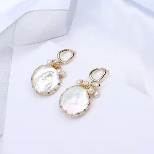 Trendy handmade gold fresh water cultured 20 mm flat pearl earrings