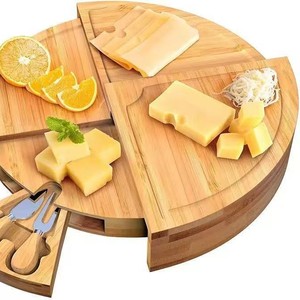 Tabla de queso giratoria de bambú personalizada, redonda, de madera maciza, con juego de cuchillos para servir en la cocina - Product Image 1