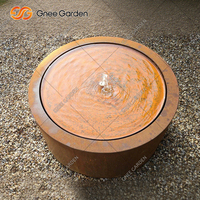 Fontaine d'extérieur moderne en acier Corten pour jardin, bassin, piscine, protection hivernale, éclairée par LED, ronde