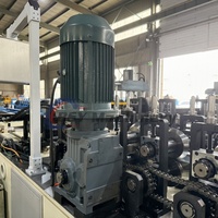 Machine de profilage entièrement automatique pour profilés en acier cornière, avec poinçonnage de trous de bride