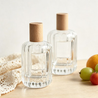 Flacon de parfum en verre cylindrique de haute qualité, logo personnalisé, flacon de parfum vide avec boîte cadeau, vaporisateur à pompe