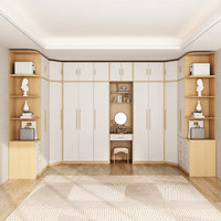 Armoire de chambre moderne en panneaux de bois avec coiffeuse et étagères d'angle à tiroirs