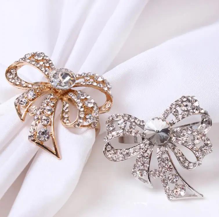 Gran oferta restaurante Decoración de mesa de boda Metal Bowknot servilleta hebilla diamante cristal Rhinestone arco servilletero anillo