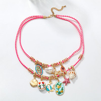 Collier double couche en cordon tressé rose avec pendentif coquillage, étoile de mer et perle peinte, style bohème, fait main pour femme