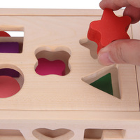 Boîte d'intelligence multifonctionnelle à quinze trous Jouet éducatif en bois transfrontalier pour enfants Cubes d'activité précoce