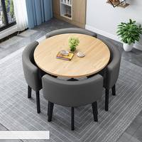 Grain de bois forme ronde minimaliste Table à manger réception Restaurant café salle à manger meubles Table à manger en bois pour 4 chaises