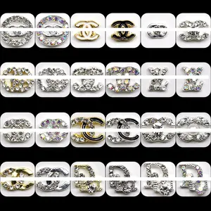 Adornos de circonita para decoración de uñas, accesorio de Metal Kawaii 3D con logotipo de marca de lujo, adornos de diamantes de imitación para decoración de uñas