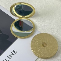 Miroir compact pliable rond avec logo personnalisé, en alliage de zinc, double face, mini miroir de voyage portable en métal, vente en gros pour cadeaux
