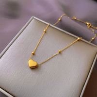 Collier ras de cou avec pendentif cœur délicat en acier inoxydable plaqué or, vente en gros d'usine, bijoux pour femmes