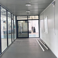 Bureau préfabriqué étanche et facile à assembler avec maison conteneur à panneaux sandwich de 20 pieds sur 2 étages pour villa mobile
