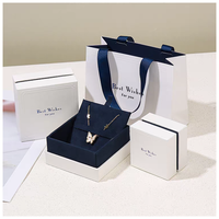 Boîte cadeau de bijoux haut de gamme personnalisable avec logo en relief, écologique, doublure en velours, pelliculage mat, réutilisable, recyclable, faite à la main