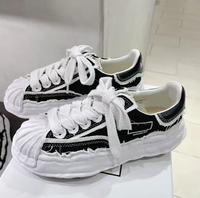 Chaussures rétro basses Sanyuan Kang pour couple, avec empeigne en maille respirante, semelle extérieure en caoutchouc, fermeture à lacets avant et semelle motif crème glacée, style Campus Wind