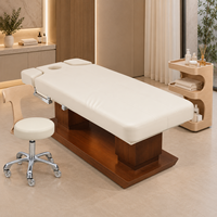 Table de massage électrique professionnelle haut de gamme avec dossier réglable, cadre en bois et chauffage, idéale pour hôtels, salons et centres de bien-être