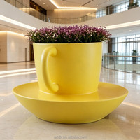 Y231 Jardinière surdimensionnée en forme de soucoupe, sculpture paysagère personnalisée en PRV, pot de fleurs et siège pour hall de centre commercial et espace commercial