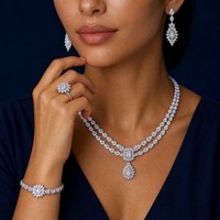 Bride Talk 3A Parure de bijoux de déclaration en cuivre avec zircone cubique CZ, motif pétales coniques multi-niveaux et finition brillante, comprenant Collier, Bague, Boucles d'oreilles et Bracelet