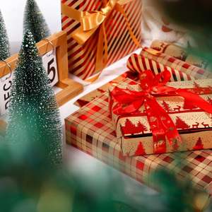 Venta al por mayor de papel de regalo de Navidad con estampado en caliente 43*300 cm papel de regalo de papel Kraft - Product Image 6