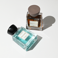 Hochwertige Premium Transparente 50ml 100ml Quadratische Leere Parfümflasche Einzigartiger Unregelmäßiger Schwarzer Brauner Deckel Nachfüllbare Glasflasche