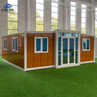 Maison conteneur pliable à double aile, extensible, en panneaux sandwich d'acier, différentes tailles (20ft/40ft), couleurs personnalisées, entrepôt moderne