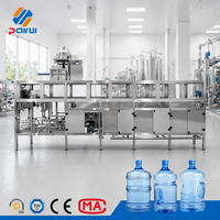 Machine de remplissage d'eau potable pure minérale en fûts de 5 gallons, 600 BPH, ligne de lavage, remplissage et bouchage 3-en-1