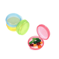 Boîte à pilules ronde en plastique portable avec pot à charnière rabattable pour un stockage pratique