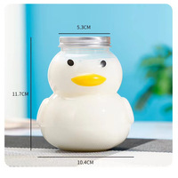 Bouteilles de jus de boisson en plastique jetables transparentes en gros, forme d'animal de dessin animé créative, avec couvercle en aluminium