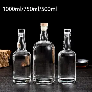 Manufacturer 500ml 700ml 750ml 1000ml Liquor Vodka Glass Bottle With Cork Stopper Spirits Whisky Tequila Gin Rum Bottle For Wine