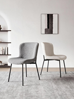 Chaise de salle à manger moderne minimaliste avec structure en acier et revêtement en lin, design haut de gamme durable pour salles à manger
