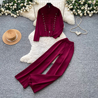 Ensemble élégant pour femme : cardigan en maille demi-zip et pantalon large pour l'automne, avec boutons métalliques