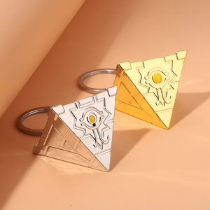 สร้อยคอและพวงกุญแจโลหะรูปปริศนา 8 ดีไซน์เกมยูกิโอ โกลเด้น มิลเลนเนียม สำหรับตกแต่ง - Product Image 1