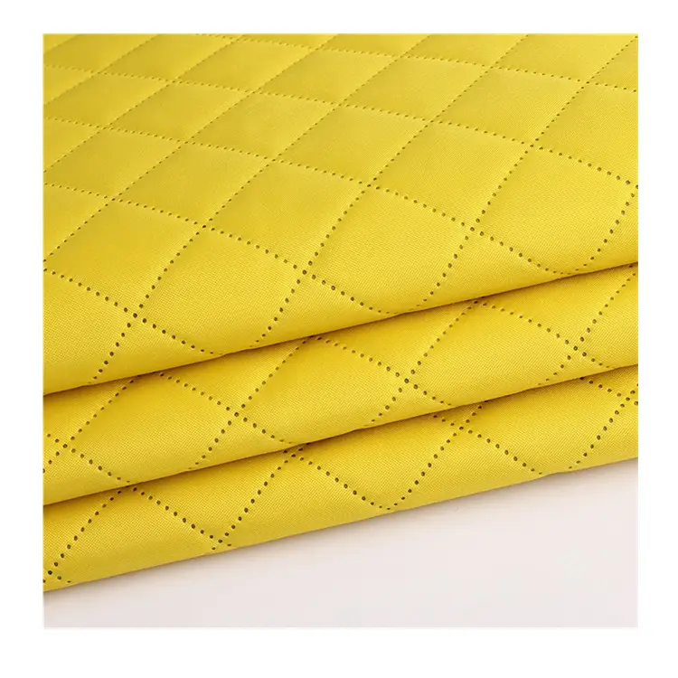 Polyester oxford fabric embossed with ultrasonic designs back side quilting with taffeta fabric or PE foam backing