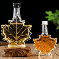 150ml 100ml Voyage Commodité Mini Feuille D'érable Whisky Pot D'alcool Petite Glucose Sirop Verre Bouteille Vide avec Couvercle En Aluminium