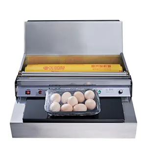 Yumurta plastik ambalaj sızdırmazlık aracı otomatik lahana ve hindistan cevizi tepsi koruyucu film sarma makinesi ev/süpermarket
