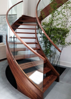 Escalier courbé sur mesure de haute qualité avec marches en bois et marches en pierre pour villas de luxe