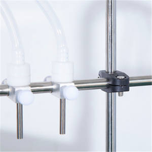 Máquina de llenado de líquidos Sinparto de 6 cabezales, eléctrica, semiautomática para botellas, alta precisión, bomba de 220 V. - Product Image 1