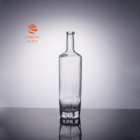 Bouteille de liqueur en verre transparent cylindrique de 700 ml, bouteille en verre à fond épais irrégulier pour la vodka, le gin, les spiritueux, vente en gros