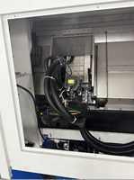 TCK-52MYC Twin Spindle 3-Axis CNC Turning Center dengan Kapasitas Batang 52mm untuk Bagian Logam Presisi Kompleks.