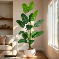 Plante artificielle d'oiseau de paradis faite à la main sans entretien, faux arbre tropical dans un pot noir pour la décoration moderne du salon OEM