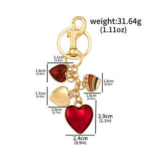 تصميم جديد حقيبة ألماس على شكل قلب قوس قزح منقط معلقة سيارة أنيقة حمراء على شكل قلب سيارة مبتكرة - Product Image 6