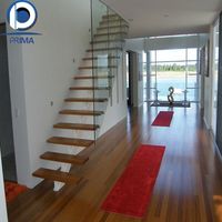 Escalier en colimaçon en bois massif sur mesure PRIMA, design flottant moderne pour villa intérieure