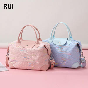 Sac de voyage multifonctionnel en toile pour femme RUIQUWIN, de haute qualité, élégant, grande capacité, durable, portable, pour l'extérieur - Product Image 1