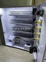 Distributeur automatique de monnaie 630 Wide à 4 niveaux pour snacks, détergents et préservatifs, idéal pour les laveries.