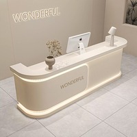 Comptoir de réception en bois courbé simple et luxueux avec éclairage LED, fabricant OEM pour salon de beauté, hôtel, bureau, commerce de détail, école, caisse