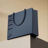 Sac cadeau en papier écologique personnalisé pour vêtements, parfums, emballages avec impression de logo, laminage, accessoire, poignée en corde