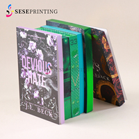 Impression de livres reliés de qualité supérieure avec bords à motifs, vernis sélectif et dorure pour romans en édition limitée OEM